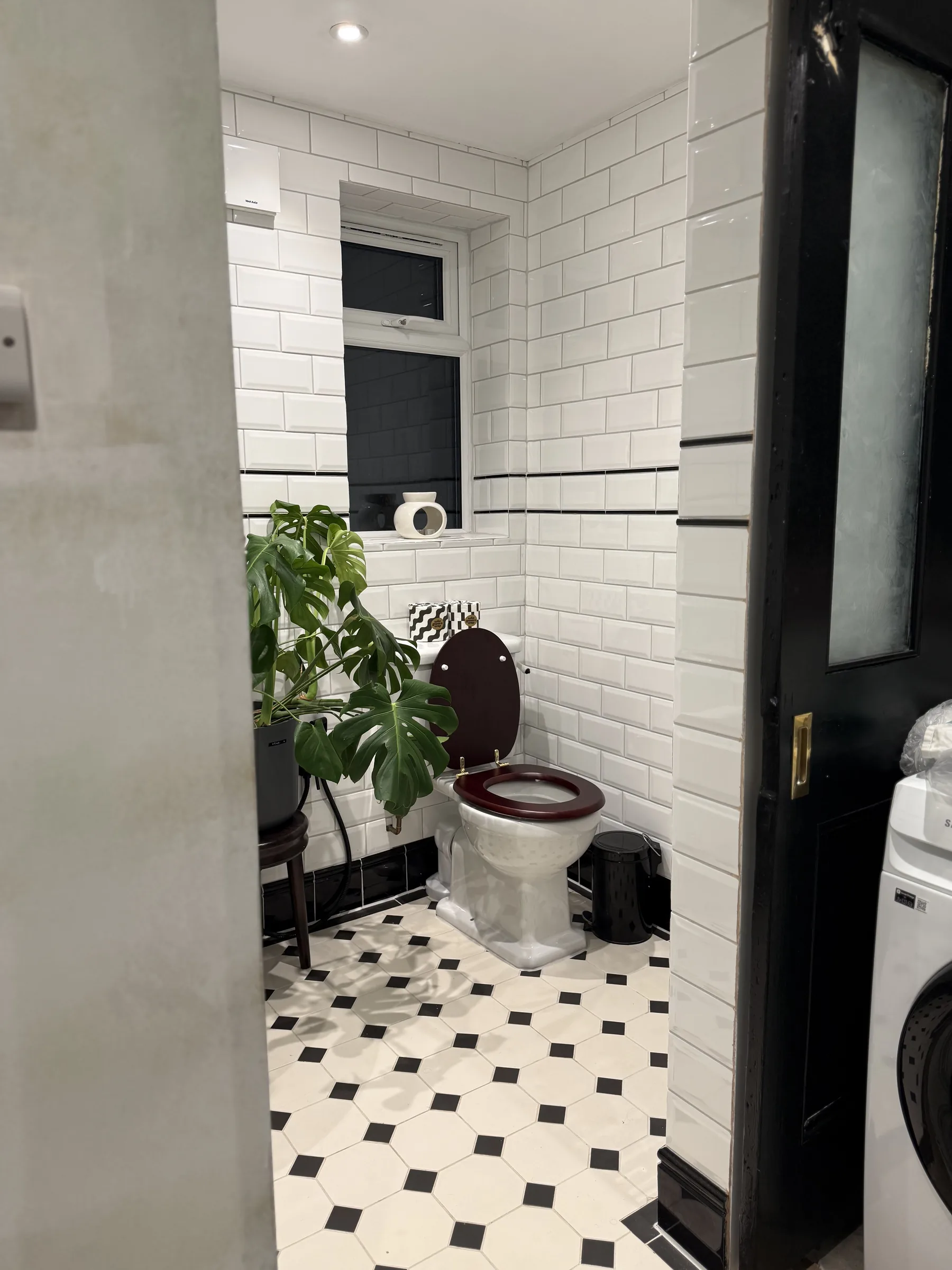 Bathroom with chrome heated towel rail