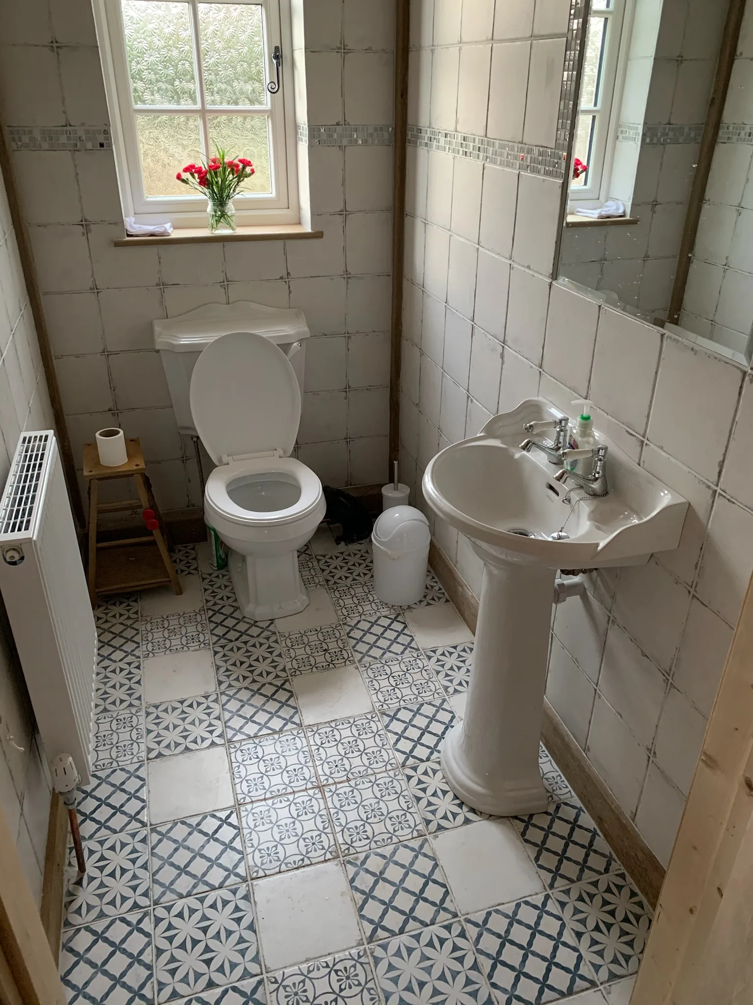 Finished bathroom with brushed brass fittings